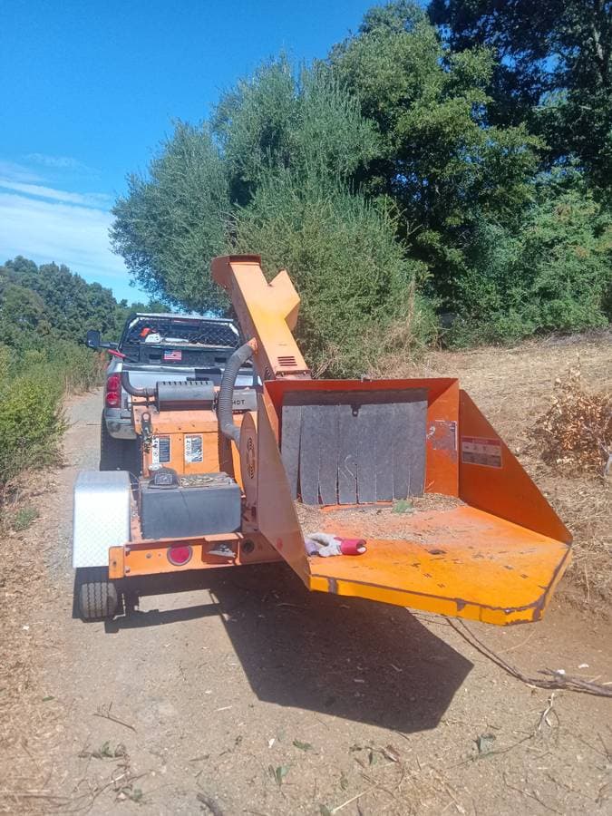 picture of a tree care machine that turns trees into mulch